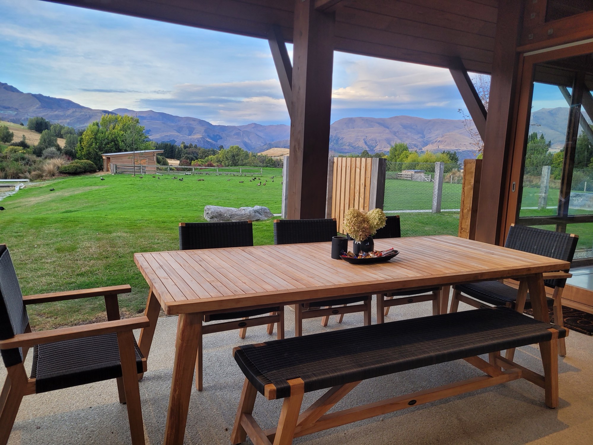 The long table in the undercover courtyard, looking out over the paddock