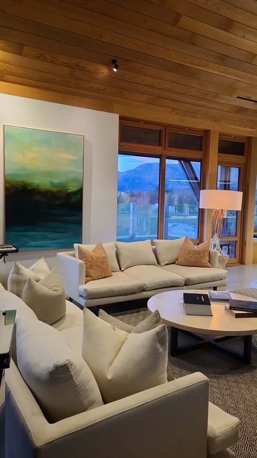 A painting above the sofa in the living room