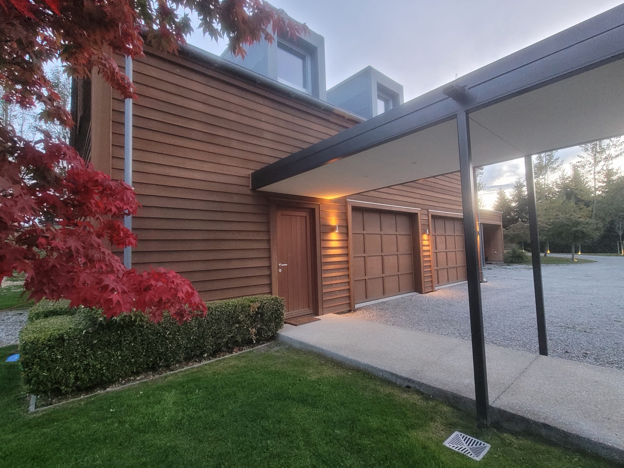 The covered walkway and the loft's front door