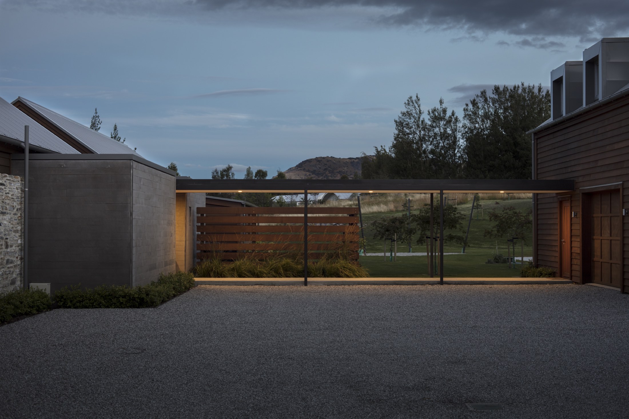 The glazed link between the buildings, at dusk