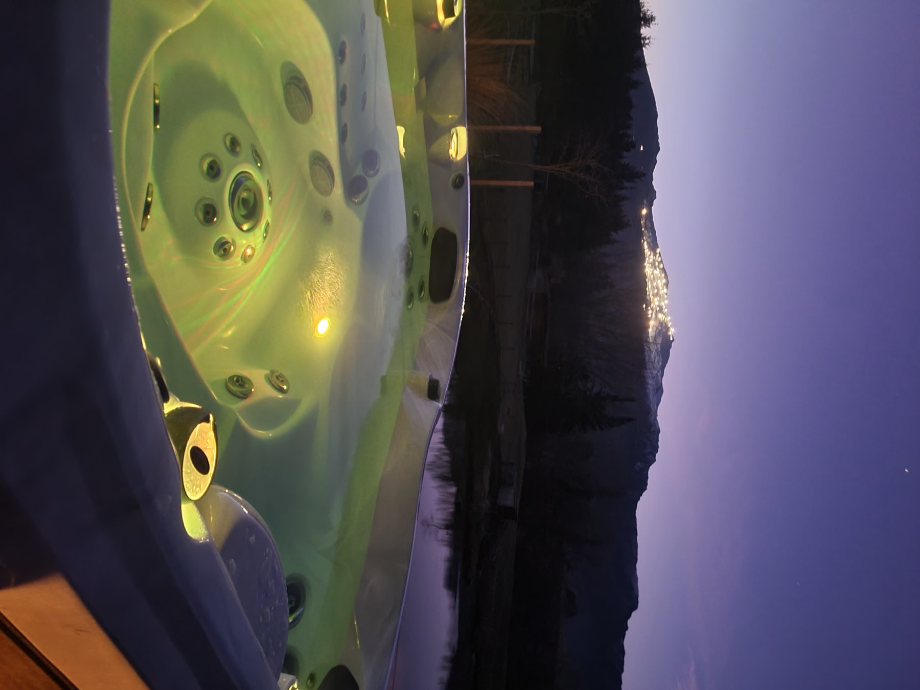 The spa and the lit mountain at last light